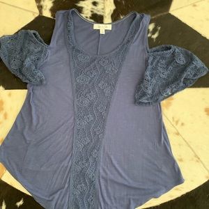 Adorable loose fit cold shoulder top